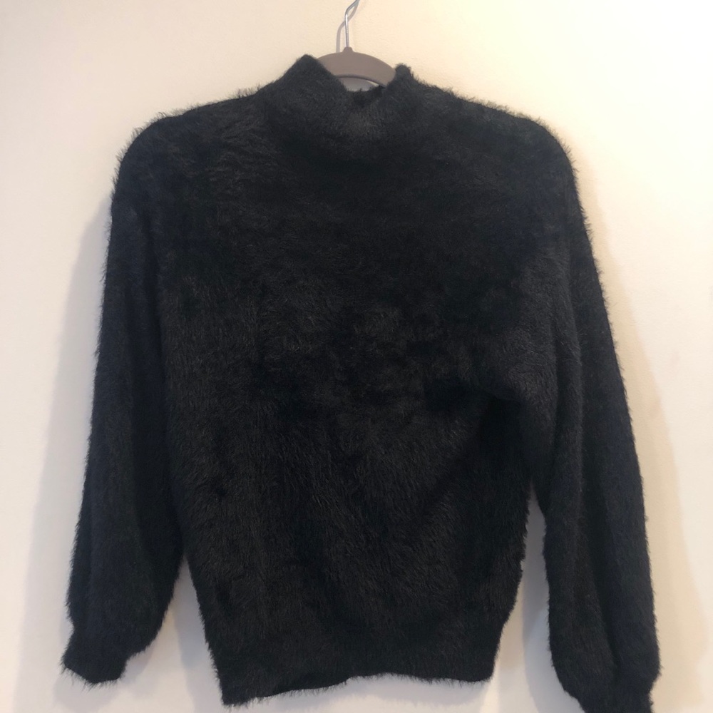 fluffy black turtleneck sweater